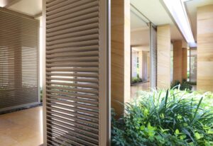 Wooden shutter style blinds on patio door