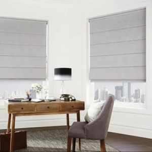 Grey roman blinds in a white home office
