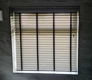 Wooden Venetian Blinds with black tapes fitted in Excell Blinds Liverpool customer's home
