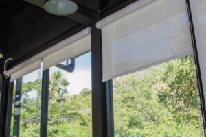 Set of white, perfect fit roller blinds
