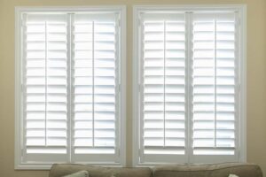 A pair of white Plantation Shutters