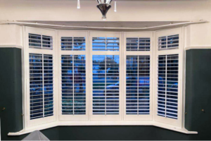 White bay window shutters