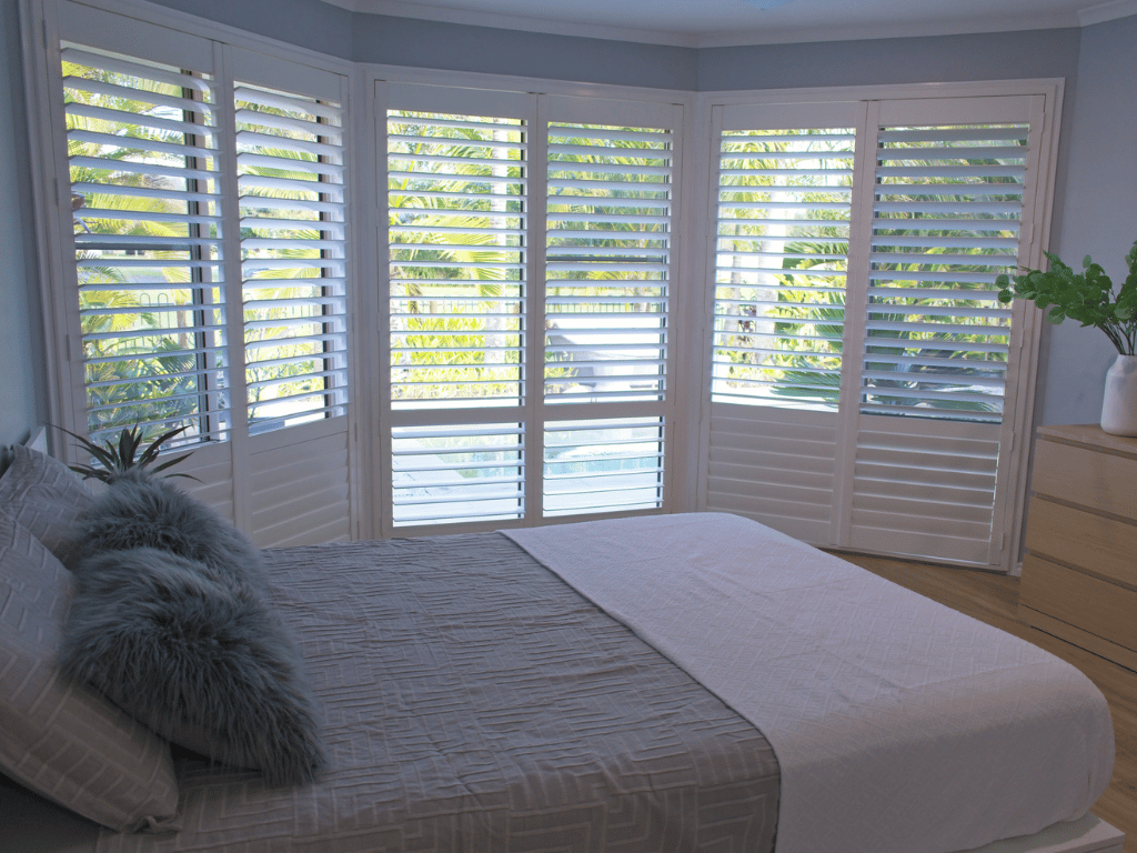 How To Dress Bay Window Shutters the Way Designers Do