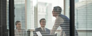 Office blinds matter for energy efficiency because they create a physical thermal barrier against solar radiation at the window level.