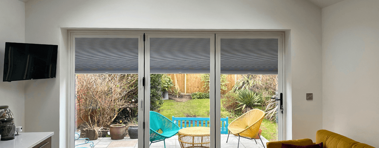 Cellular perfect fit blinds in bifold doors.