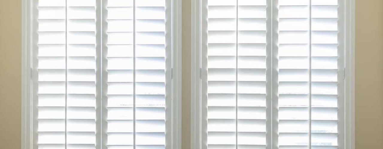 A pair of white Plantation Shutters