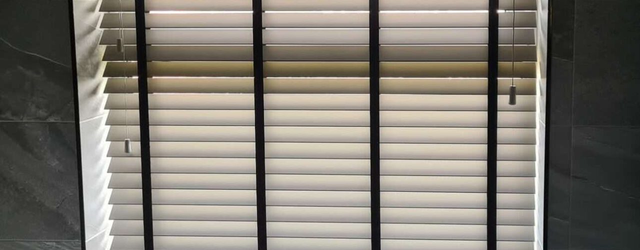 Wooden Venetian Blinds with black tapes fitted in Excell Blinds Liverpool customer's home
