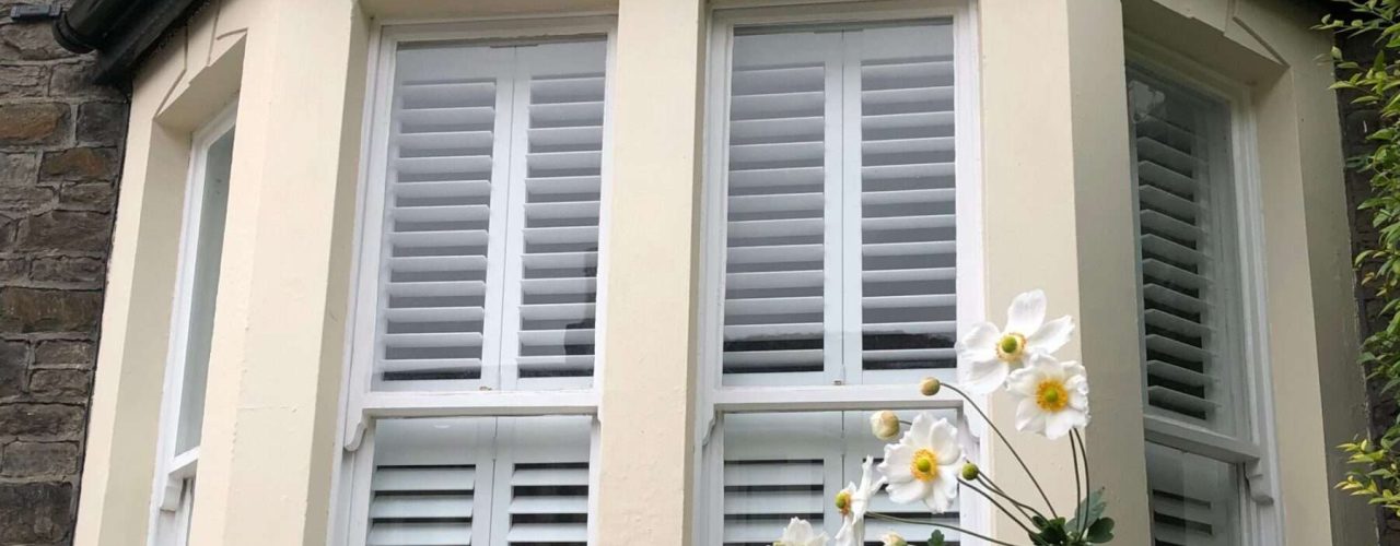 Tier,On,Tier,Shutters,In,A,Bay,Window