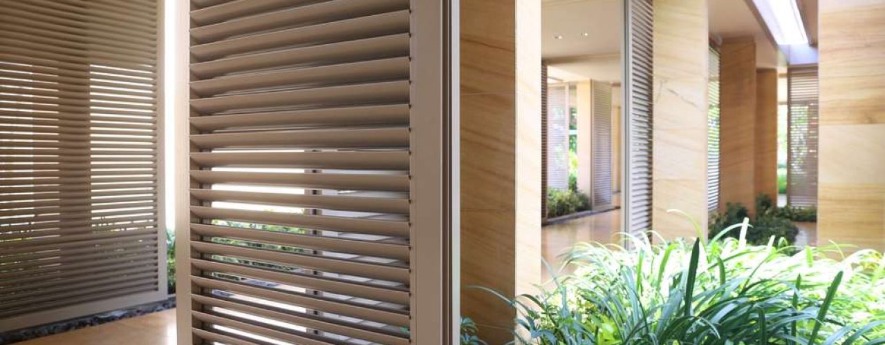 Wooden shutter style blinds on patio door